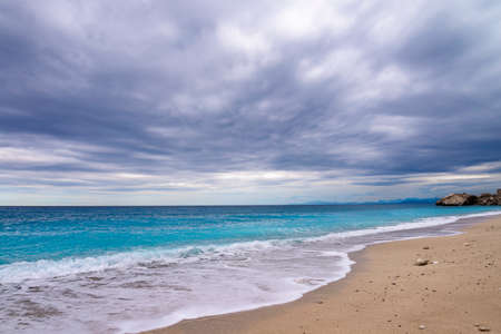 Tropical  sand beach and blue sky, sea before the stormの写真素材