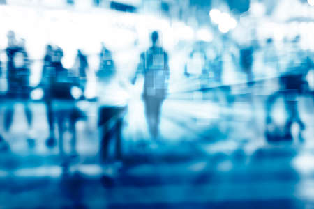 filtered blur abstract people background, unrecognizable silhouettes of people walking on a street, face detection technologyの写真素材