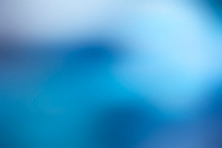 abstract blue background with bokeh defocused lights and shadowの写真素材