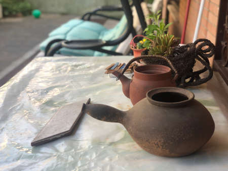 antique old pots in the home backyard for decoration of home by old potsの写真素材