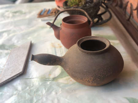 antique old pots in the home backyard for decoration of home by old potsの写真素材