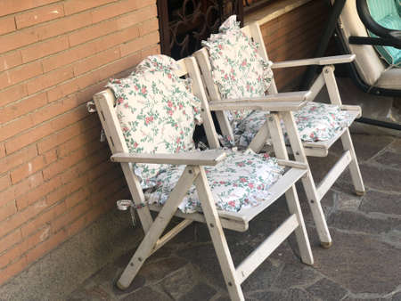 wooden chairs in home lawnの写真素材