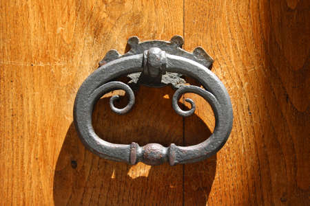 handle of old door in rome italyの写真素材