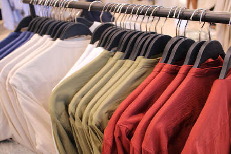 shirts hanging on a garment store in rome italyの写真素材