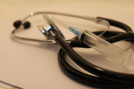 stethoscope and injection syringeの写真素材