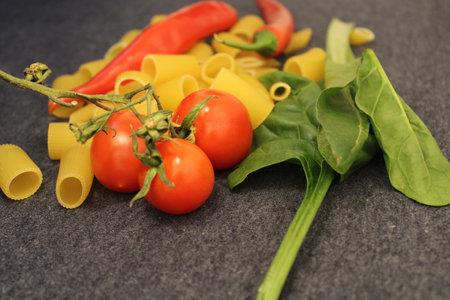 uncooked pasta raw pasta on tableの写真素材
