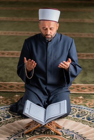 A Muslim man praying inside the mosque.