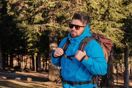A male traveler hiking forest adventure travel active lifestyle.の写真素材