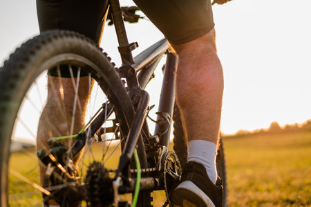 Mountain bike cyclist riding outdoor.の写真素材