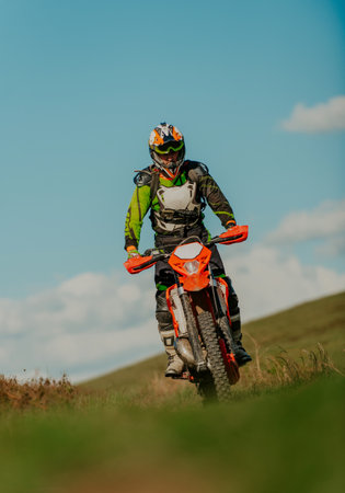 Professional enduro bike rider on action. Motocross sport.