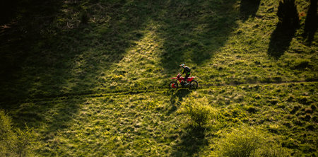 Professional enduro bike trail riding dirt road. Motocross sport.