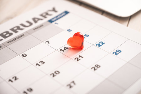 February 14, Valentine's Day is marked on the calendar with a red heart symbolの写真素材