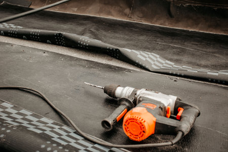 roof repair. a roofer repairs the roof. roofing toolsの写真素材