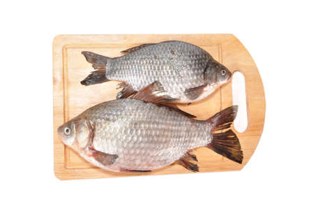 Perches lie on a wooden boardの写真素材