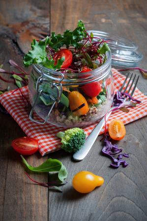 Quinoa salad with veggies and micro greens, healthy homemade vegan food, vegetarian diet, vitamin snackの写真素材