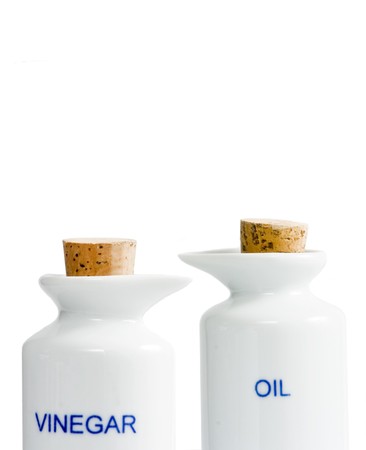 oil and vinegar bottles on white backgroundの写真素材