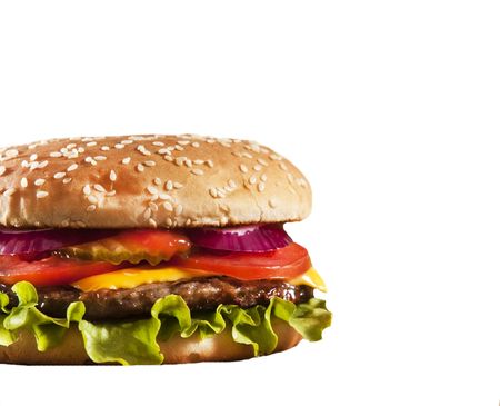 Cheeseburger with onions tomato and ketchupの写真素材