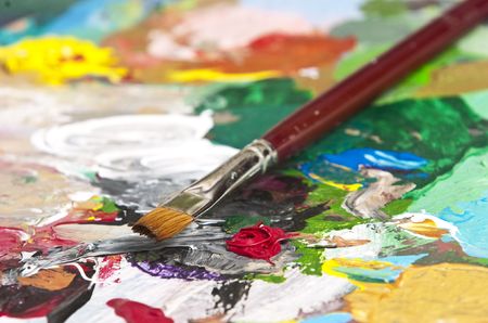 Detail of a paintbrush on an artist's paletteの写真素材