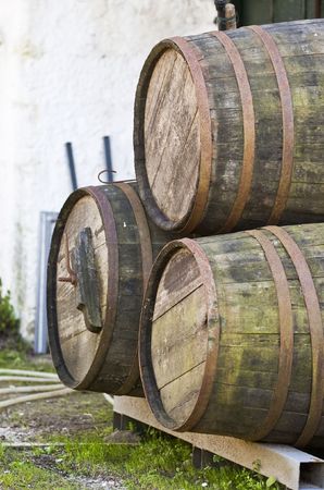 Old oak wine barrels on a mediterranean setting