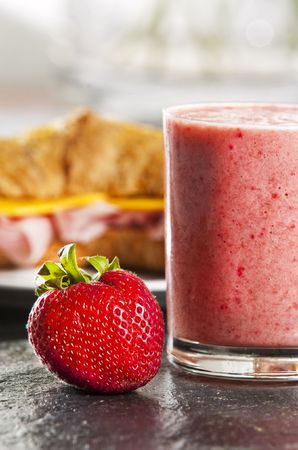 Continental breakfast with croissant  and strawberry smoothieの写真素材