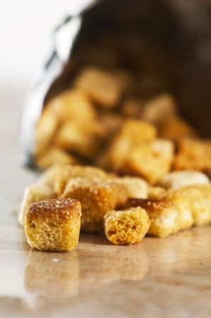 Store bought croutons on tabletopの写真素材