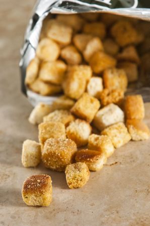 Store bought croutons on tabletopの写真素材