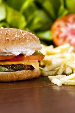 Cheeseburger with lettuce tomato and mayoの写真素材