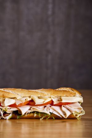 Turkey sandwich with cheese lettuce and tomatoの写真素材