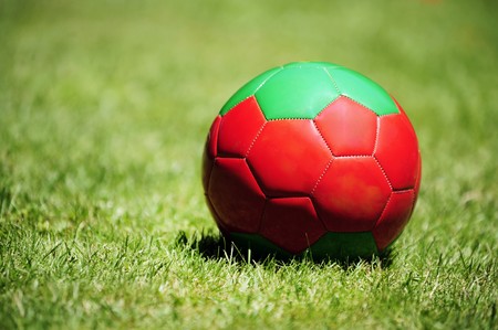 a soccer ball on a football pitchの写真素材