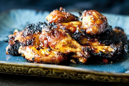 A delicious batch of hot and spicy chicken wingsの写真素材