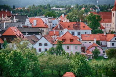 Roofs European city on a bright sunny day. Red tiles and beautiful structure.の写真素材