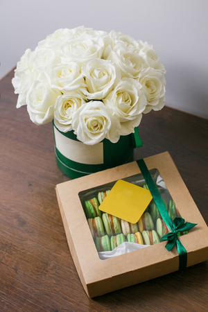 Rich bunch of pink eustoma and roses flowers, green leaf in hand Fresh spring bouquet. Summer Backgroundの写真素材