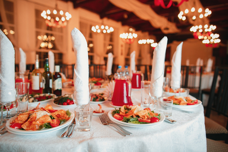 Beautifully organized event - served banquet tables ready for guests.の写真素材