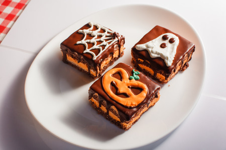 Funny delicious cakes for Halloween on the table. horizontal view from above.の写真素材