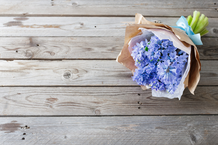 blue hyacinth on wooden table and copy-space for your text. Rustic old tableの写真素材