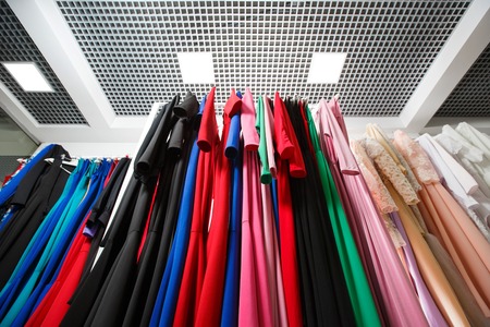 Clothing on hanger at the modern shop boutiqueの写真素材
