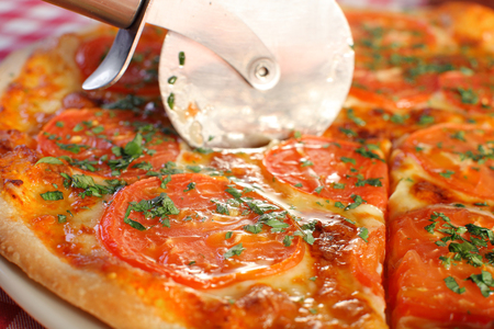 Homemade Margarita Flatbread Pizza with Tomato and Basil.の写真素材