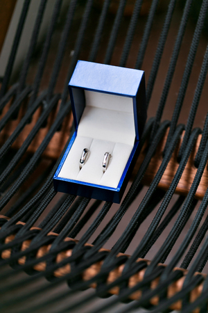 jewelry blue box open. Small miniature vintage for keeping jewelry such as necklace, rings or earrings.の写真素材