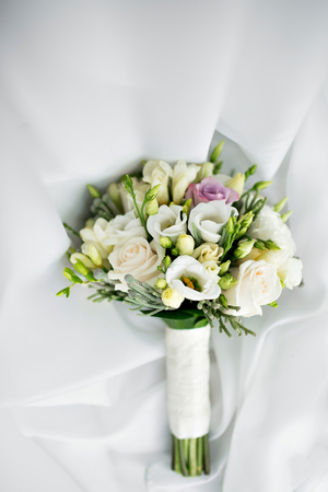 luxury Wedding bouquet. The concept of marriage and love. accessories for just married ceremony close-up. Fresh flowersの写真素材