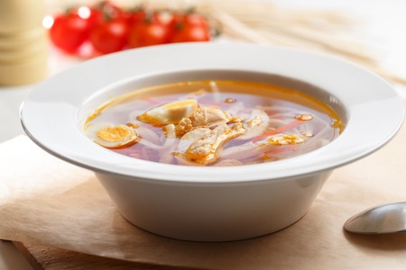Close up of classic chicken noodle soup.の写真素材