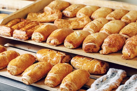 Freshly baked bread and puffson tray.