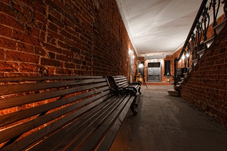 Modern industrial creative workspace. staircase with textured brick walls to the attic loftの写真素材