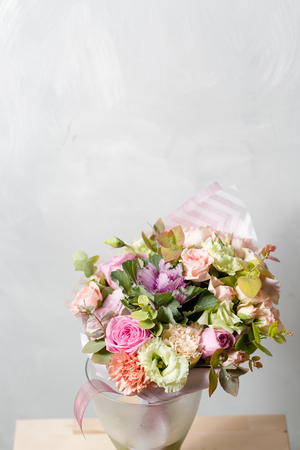 Flower composition on a gray background. Wedding and Festive decor. Bouquet from spring flowers. copy spaceの写真素材