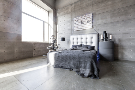Modern empty bedroom in loft style with grey colors and wooden hand made Christmas tree with presents.の写真素材