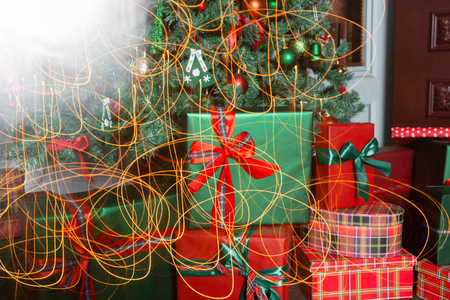 pile of christmas Christmas gifts close-up under the Christmas tree. red and green presentsの写真素材