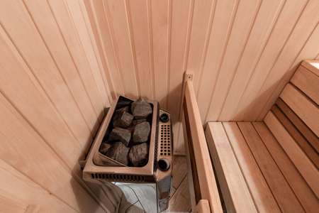 Interior of new Finnish sauna, infrared panels for medical procedures, classic wooden sauna.の写真素材