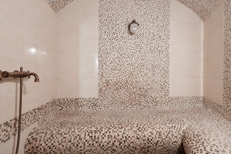 Interior of a Turkish bath with ceramic tile in roman style. Spa centre or hotel.の写真素材