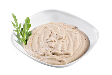 Delicious mushroom cream soup with mushrooms champignon and potato in white bowl.の写真素材