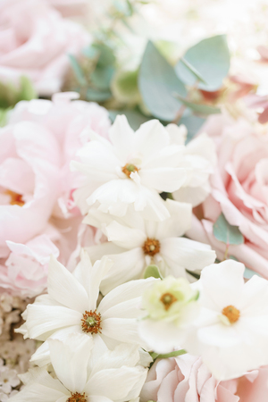 Wedding bouquet of white lilac, roses, peony and buttercup. Lots of greenery, modern asymmetrical disheveled bridal bunch. Spring flowersの写真素材