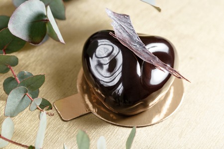 Delicious chocolates cakes. Glossy glaze and chocolate decor. Different forms. dessert pie for sale...